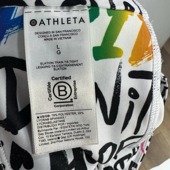 NWOT ATHLETA ELATION TRAIN 7/8
Tight Leggings PRIDE Graffiti words L - Picture 13 of 13